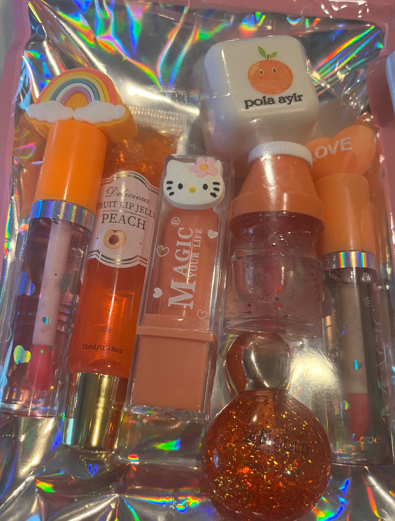 Orange lip gloss, hello kitty lip balm, peach jelly lip gloss, rainbow color changing lip oil, orange lip balm, 