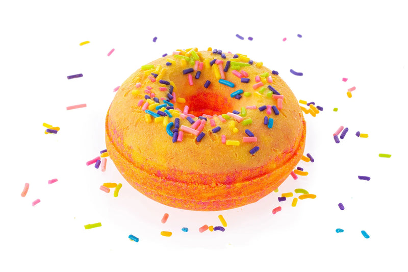 Monkey Farts scented orange bath bomb shaped as a donut with skinsafe sprinkles and colorant